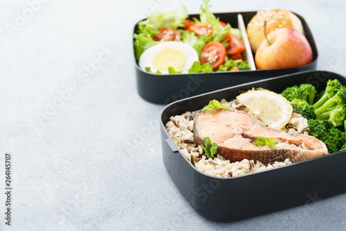Lunch boxes with food ready to go for work or school.
