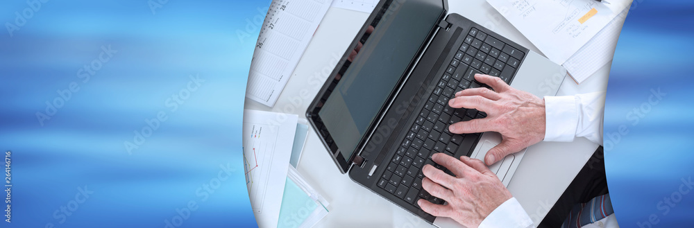 Businessman working on his laptop. panoramic banner Businessman working on his laptop. panoramic banner