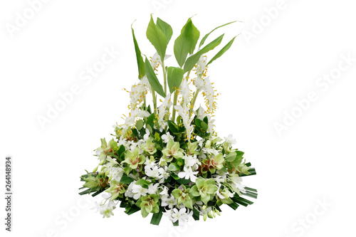 Wedding floral decoration with tropical green leaf plants and exotic flowers (dancing lady ginger, white orchids and Curcuma), floral arrangement bouquet isolated on white with clipping path.
