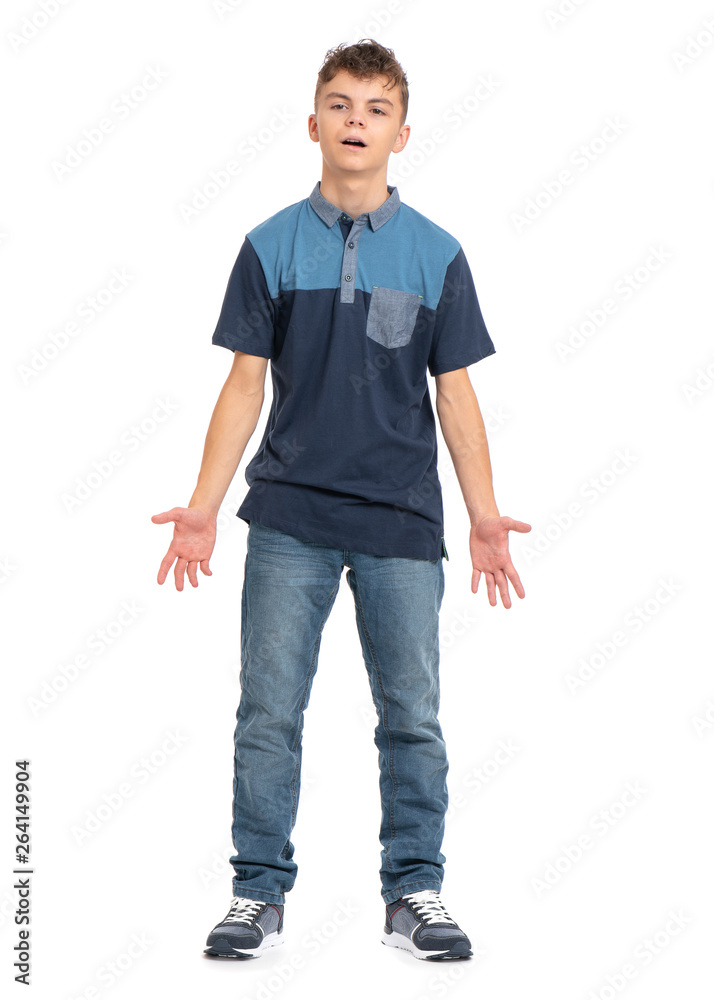 Full length portrait of young caucasian teen boy, isolated on white  background. Funny tired teenager put down his hands and looking away.  Handsome child posing at studio. Stock Photo | Adobe Stock