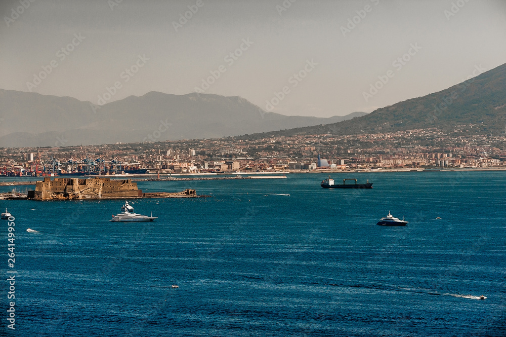 landscapes of Naples; the coast of Italy; housing quarters; blue sea and ships