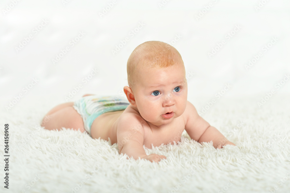 Portrait of beautiful baby boy on bed Portrait of beautiful baby boy on bed
