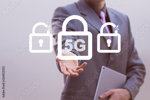 Businessman presses button 5G network wireless systems wifi locked security icon on virtual electronic user interface.