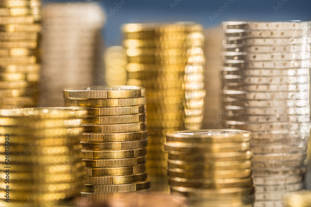 Towers of the euro coins stacked in different positions Towers of the euro coins stacked in different positions