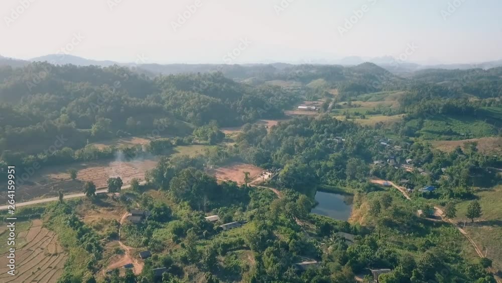 Aerial View, Flying over the mountains and forest with beautiful clouds and sky in sunrise,Landscape nature with aerial camera bird eye view. Aerial View, Flying over the mountains and forest with beautiful clouds and sky in sunrise,Landscape nature with aerial camera bird eye view.