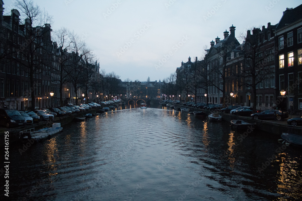 Romantic evening on the canals of Amsterdam