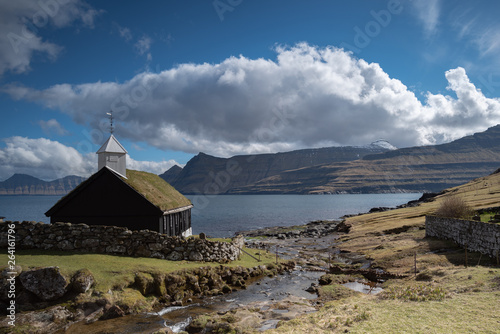 Small village church in Funningur located on the island of Eysturoy, Faroe Islands