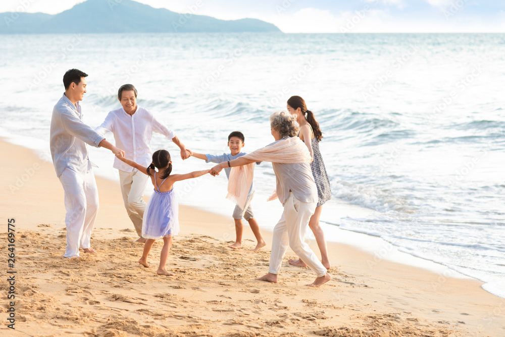 Happy family having fun on beach Happy family having fun on beach