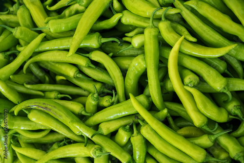 Green chilli pepper background.