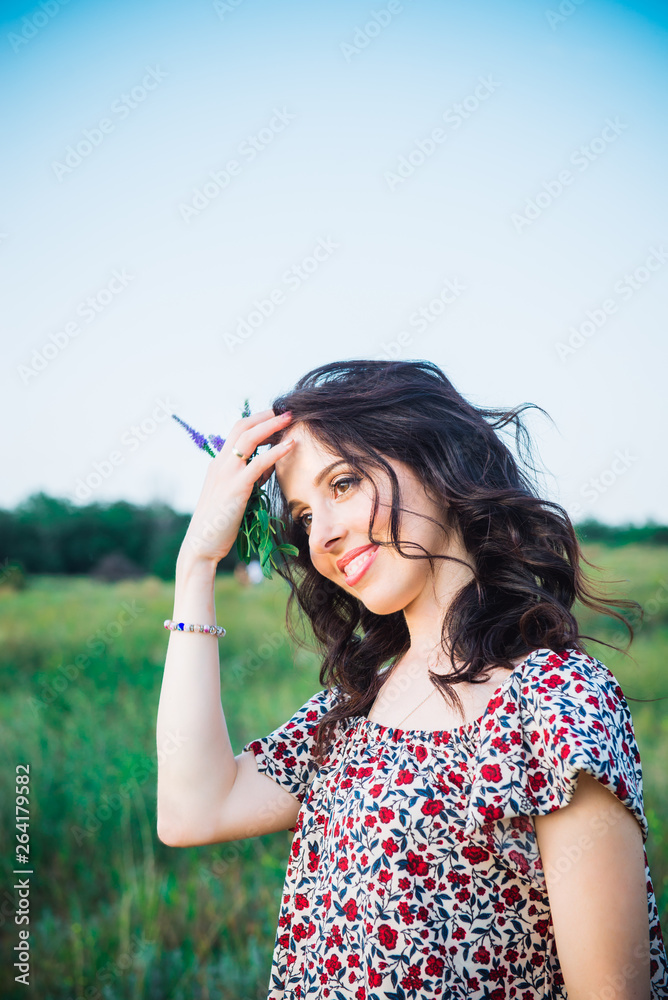 Close up Portrait of caucasian young woman or girl on green meadow enjoying nature summer. Calm and harmony. Nature rest. Summer vacation,fun, positive mood,romantic. Vertical card. Copy space.