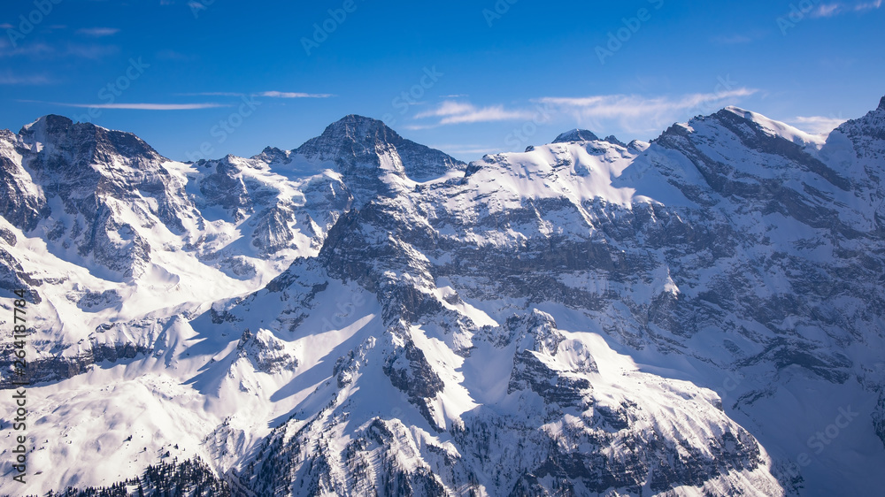 Panoramic of a snow with blue sky on the mountain of Alps in Switzerland