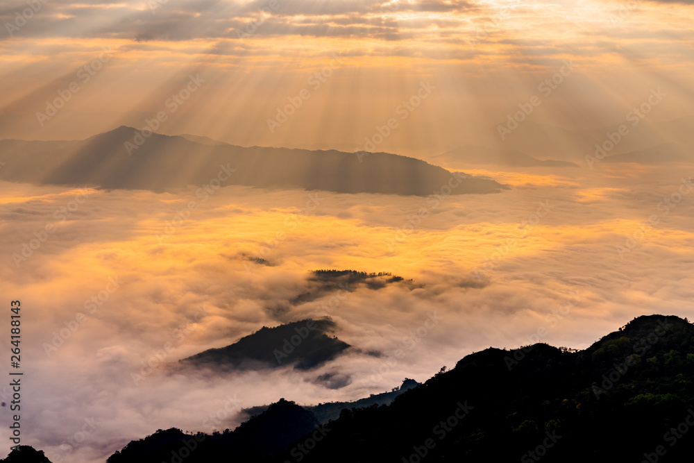 Sunrise with mist on hills 