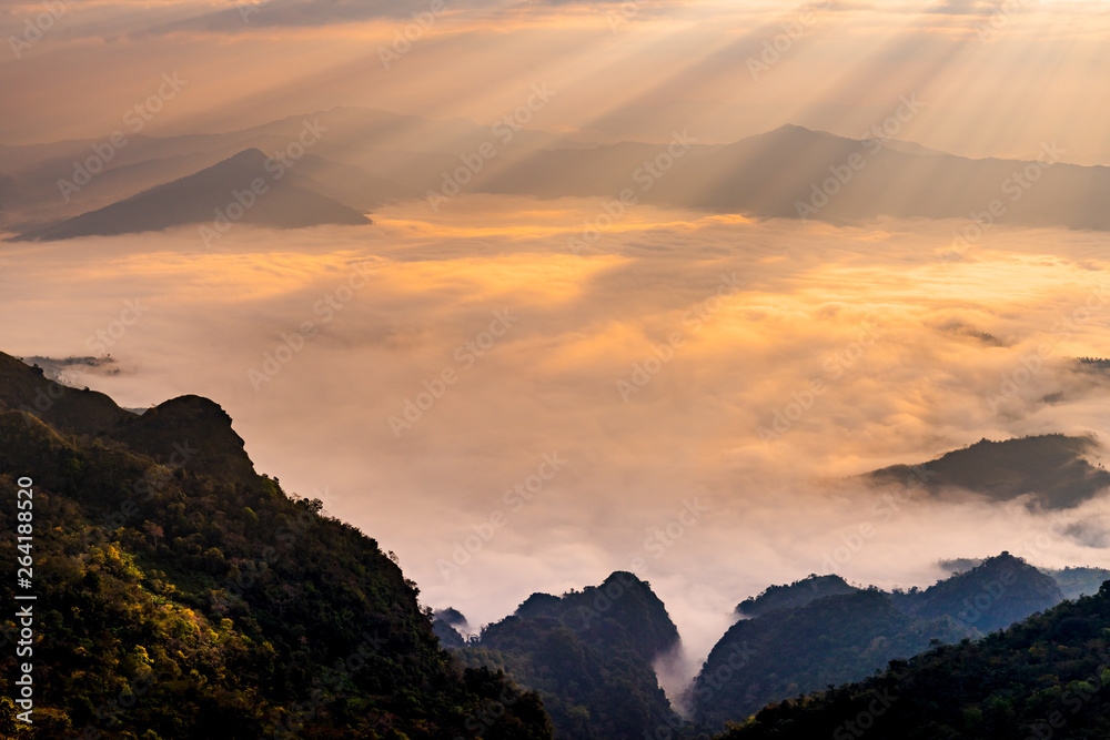 Sunrise with mist on hills Sunrise with mist on hills