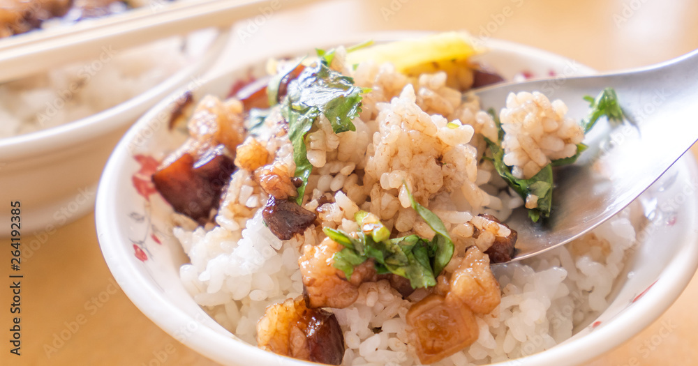 Braised pork over rice - Taiwan famous traditional street food delicacy. Soy-stewed pork on rice. Travel design concept. Top view,copy space,close up Braised pork over rice - Taiwan famous traditional street food delicacy. Soy-stewed pork on rice. Travel design concept. Top view,copy space,close up