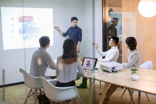 Business people having meeting in board room  photo