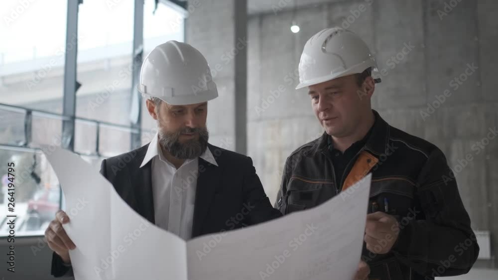 Portrait Of Factory Worker Talking To Senior Engineer. 4k Portrait Of Factory Worker Talking To Senior Engineer. 4k