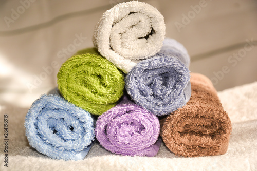 terry colorful towels folded in rolls