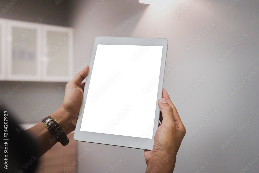 Mockup tablet on businessman hands empty display on home table with blur background. - Image - Image Mockup tablet on businessman hands empty display on home table with blur background. - Image - Image