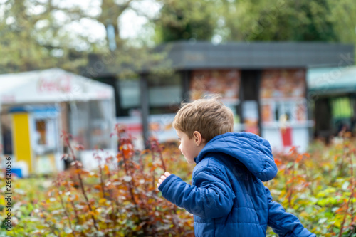 Small child running in a park