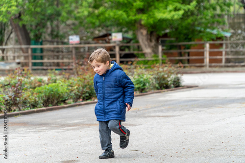 Small child running in a park