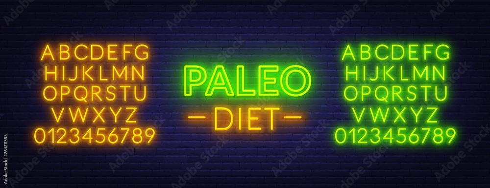 Neon paleo diet sign on brick wall background. Neon alphabet . Neon paleo diet sign on brick wall background. Neon alphabet .