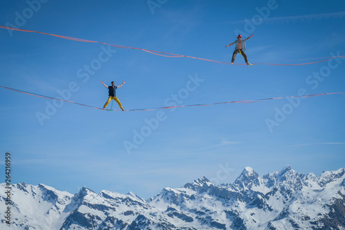 two people doing highline in the French Alps, Auvergne-Rhône-Alpes, Bourg-Saint-Maurice, France © Fred Marie