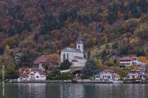 The autumn view of Catholic church Eglise Saint-Blaise at town of Sevrier in the Haute-Savoie department, France