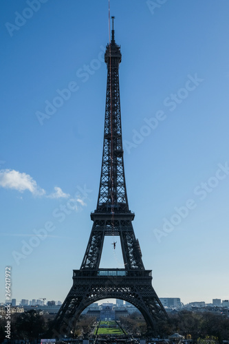a man walk on a highline between Eiffel tower and Trocadero, Île de France, Paris, France