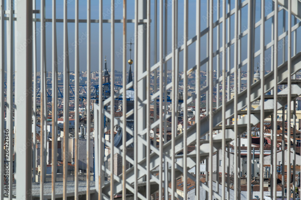 Panoramic view of Madrid behind the bars Panoramic view of Madrid behind the bars
