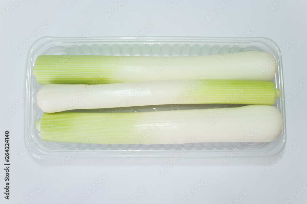 Leeks on plastic tray package Leeks on plastic tray package