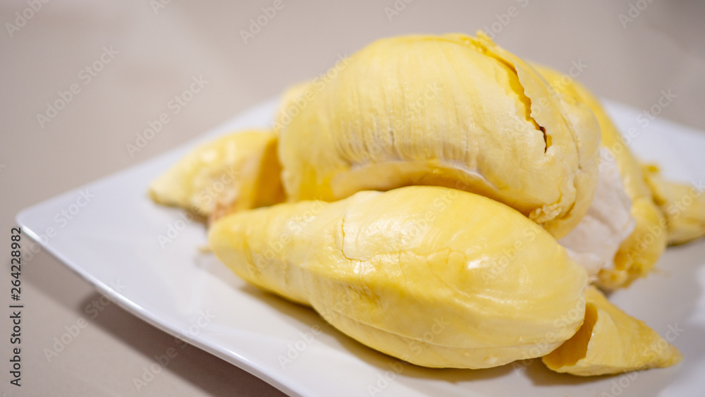 Yellow durian is appetizing in a white dish. The fruit king of Thailand