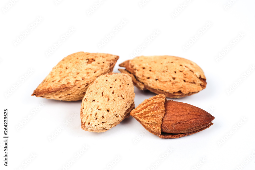 Dry Almonds nuts with shell on white background ,health food. Dry Almonds nuts with shell on white background ,health food.