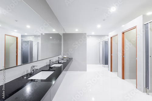 Schilderij op canvas public Interior of bathroom with sink basin faucet lined up Modern design