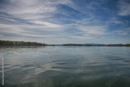 "Smoother" a glassy dreamy morning at the lake with blue sky and clouds reflected Zen Duder Lake James Collection
