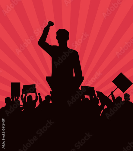 man making a speech and audience with signboard silhouette