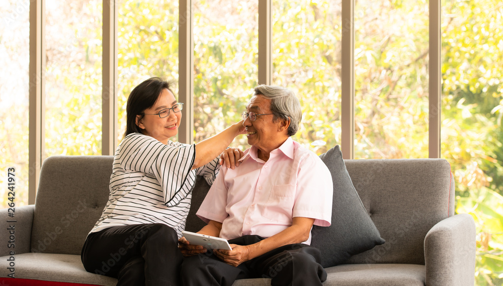 Senior couples relax on holiday with modern technologe Senior couples relax on holiday with modern technologe
