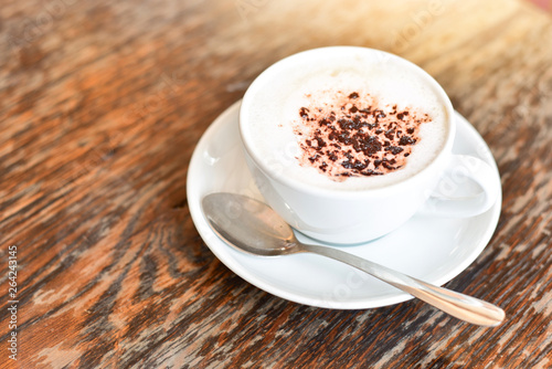 Cup of Cappuccino on Wooden Table