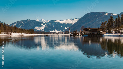 Beautiful alpine winter view with reflections at the famous Piller lake-Tyrol-Austria © Martin Erdniss