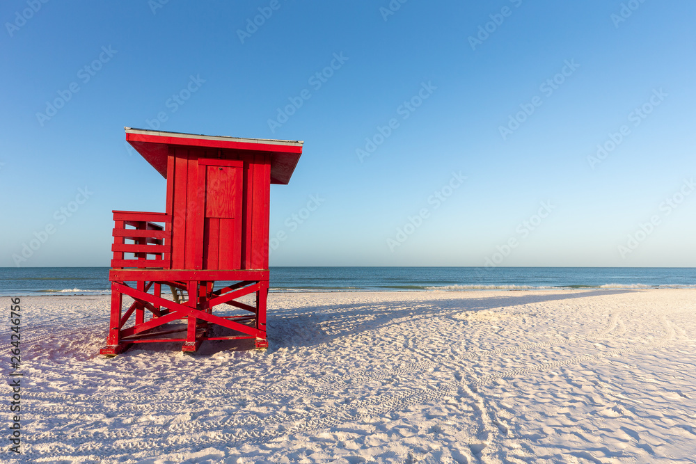 Red Lifeguard Tower on a Morning Beach Red Lifeguard Tower on a Morning Beach