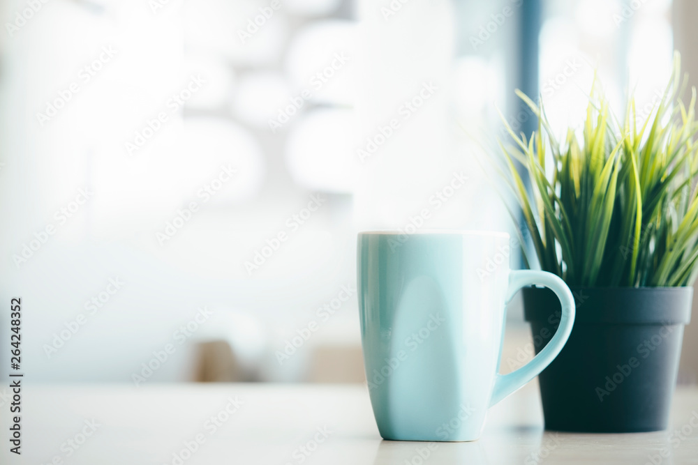 A cup of coffee on the table. A cup of coffee on the table.