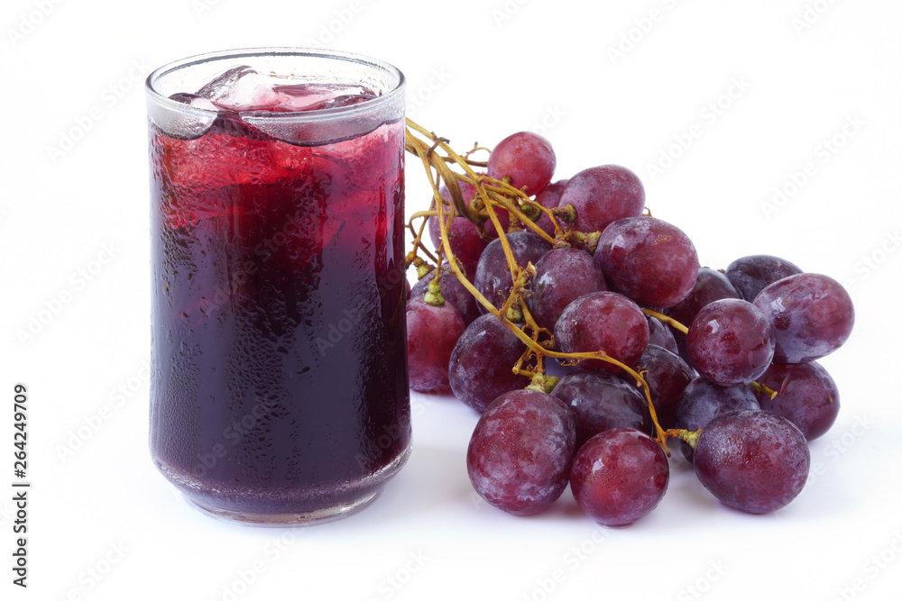 Red grape juice in glass and grape fruit isolated on white background