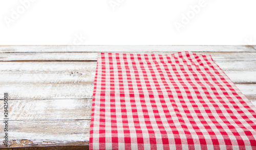 chekered tablecloth on empty table isolated on white background copy space photo