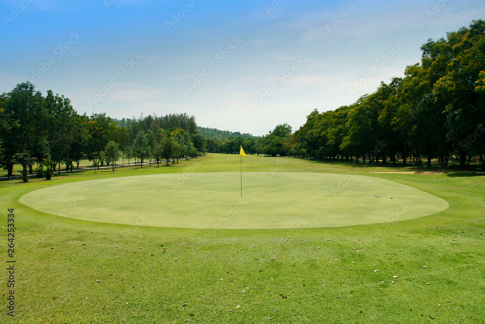 The evening golf course has sunlight shining down at golf course in Thailand The evening golf course has sunlight shining down at golf course in Thailand