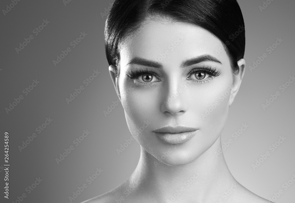 Naklejka premium Monochrome lashes extensions woman eyes macro beauty