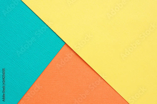 Abstract geometric background turquoise, yellow and orange textured paper...