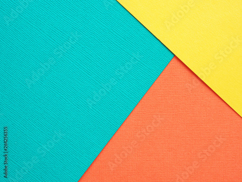 Abstract geometric background blue, orange and yellow textural paper..