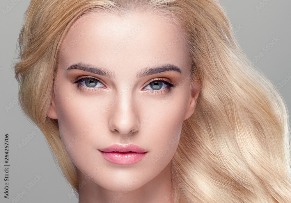 Beautiful hair woman blonde long hairstyle beauty healthy skin face closeup Beautiful hair woman blonde long hairstyle beauty healthy skin face closeup
