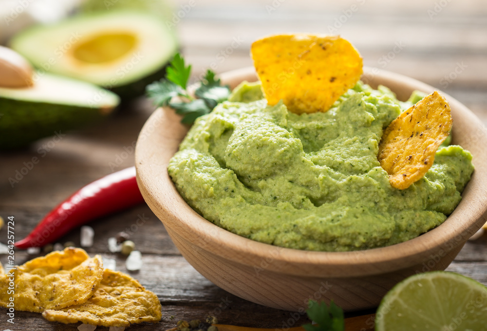 Homemade guacamole dip in the bowl Homemade guacamole dip in the bowl