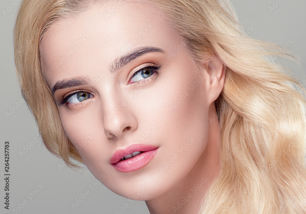 Beautiful hair woman blonde long hairstyle beauty healthy skin face closeup Beautiful hair woman blonde long hairstyle beauty healthy skin face closeup