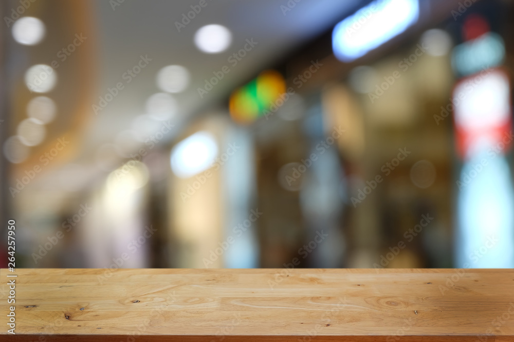 Empty dark wooden table in front of abstract blurred bokeh background of restaurant . can be used for display or montage your products.Mock up for space. Empty dark wooden table in front of abstract blurred bokeh background of restaurant . can be used for display or montage your products.Mock up for space.